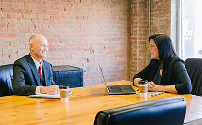 An Agile assurance meeting between product owner and SRO.