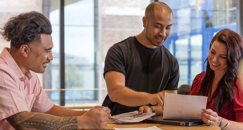 A couple of Boosters enjoying a discussion with a client who has joined us in the Boost studio to collaborate on their project.