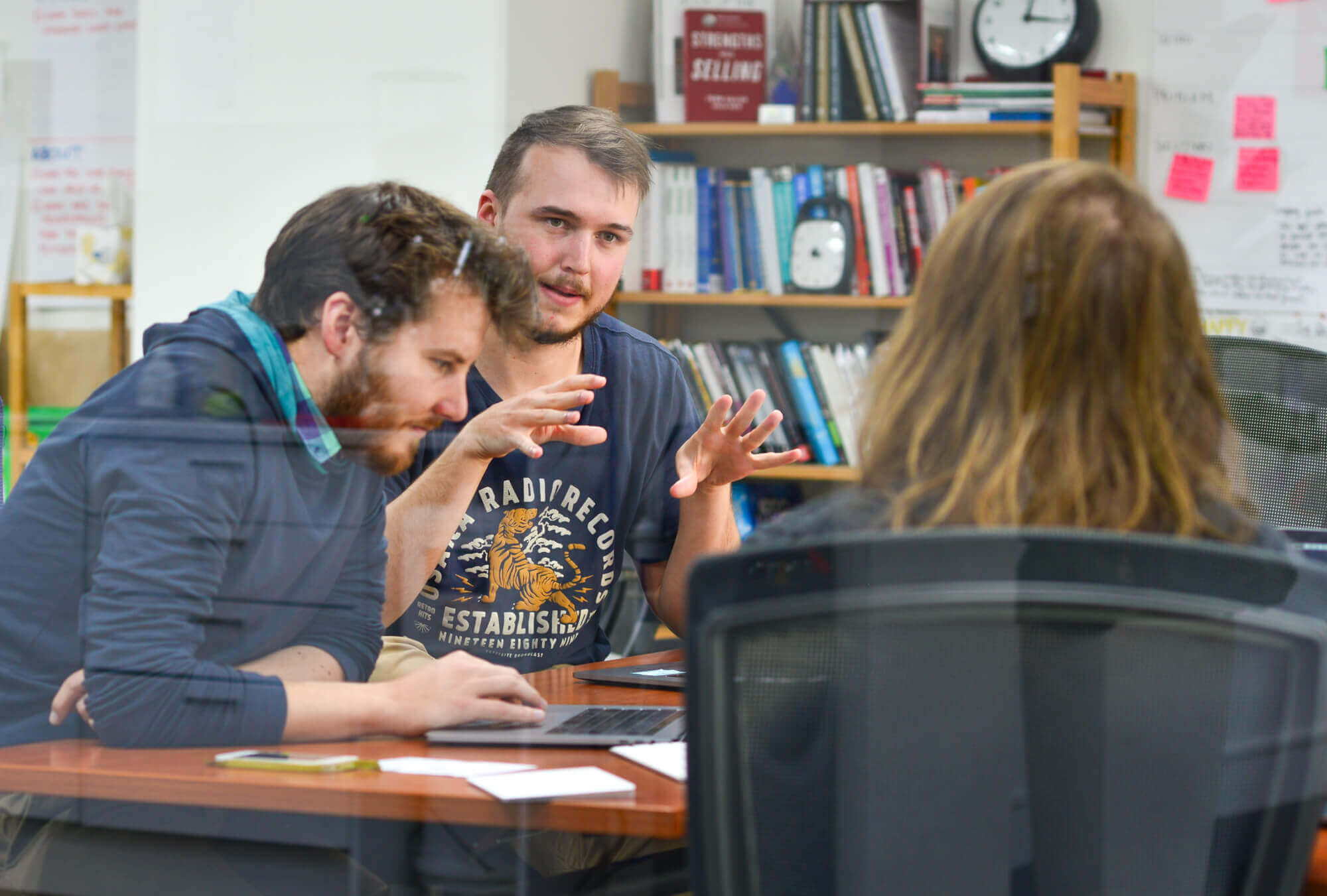 Discussing an activity in a project discovery workshop.