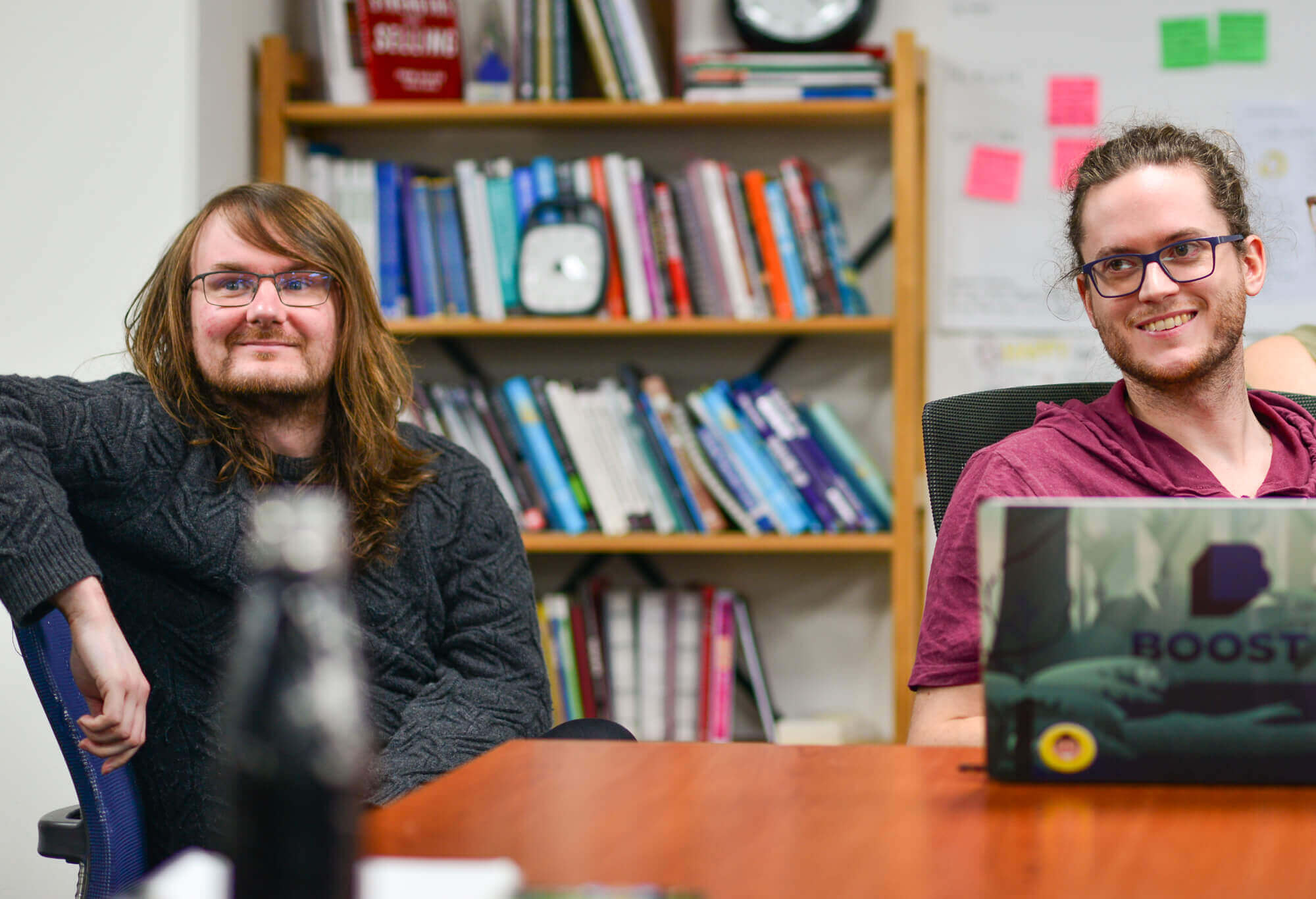 A couple of Boost developers discussing the best way to achieve the outcomes the client is looking for.