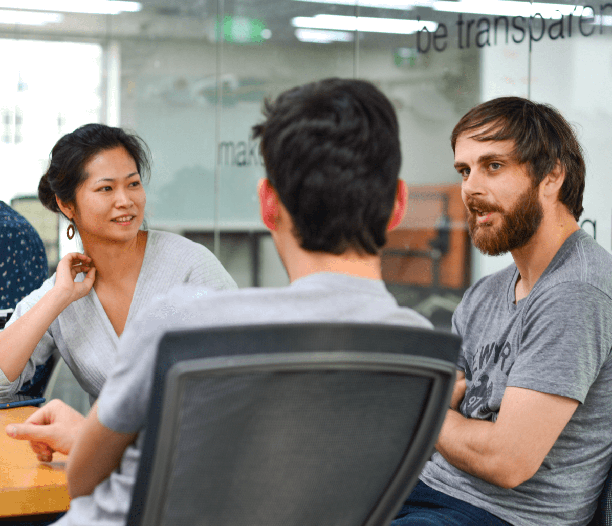 Discussing an activity in a project discovery workshop.