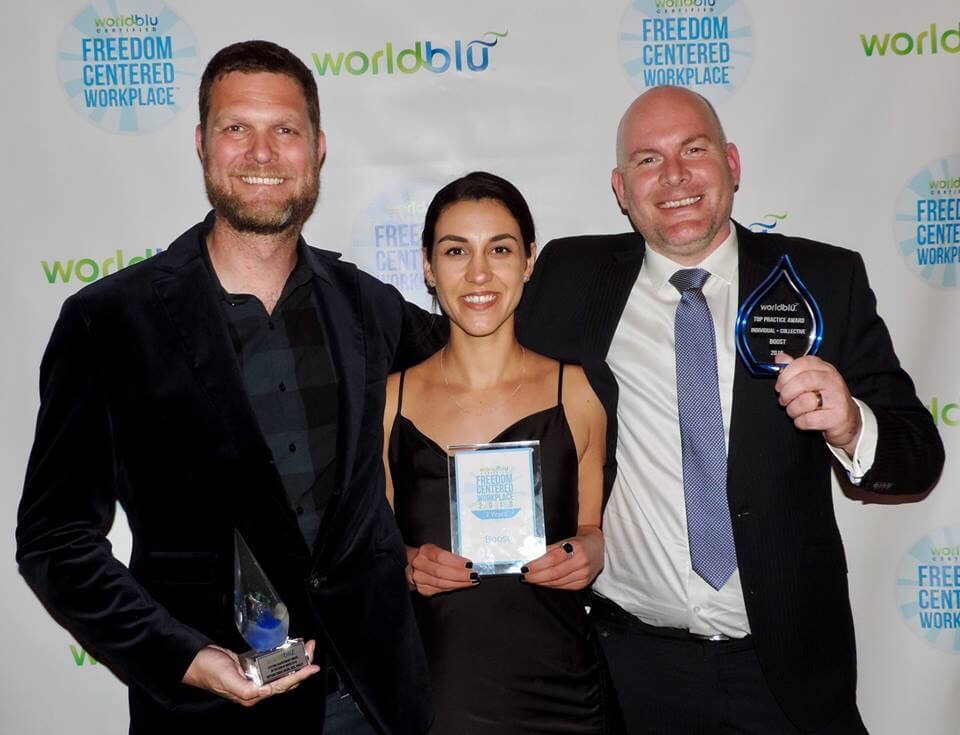 Nathan, Rebecca and Gavin with their awards at WorldBlu Freedom-Centred Workplace Awards in 2018.
